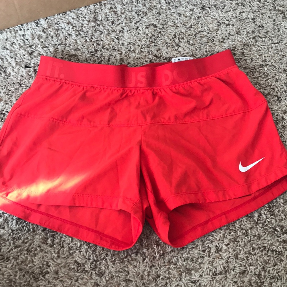 Red Nike dri fit compression shorts